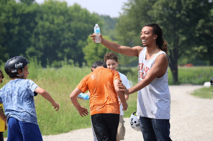 Liam keeping the campers cool on HOT day.