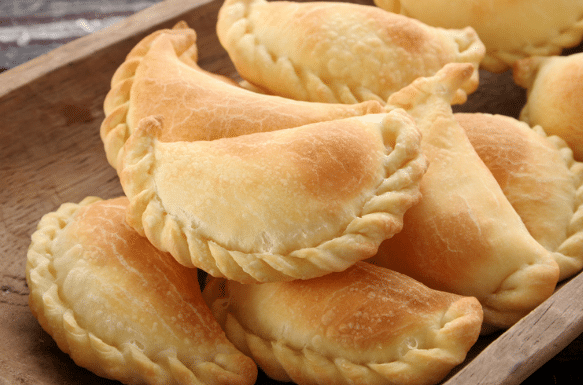 Empanada de Queso's are filled with queso chanco, a swiss-type cheese