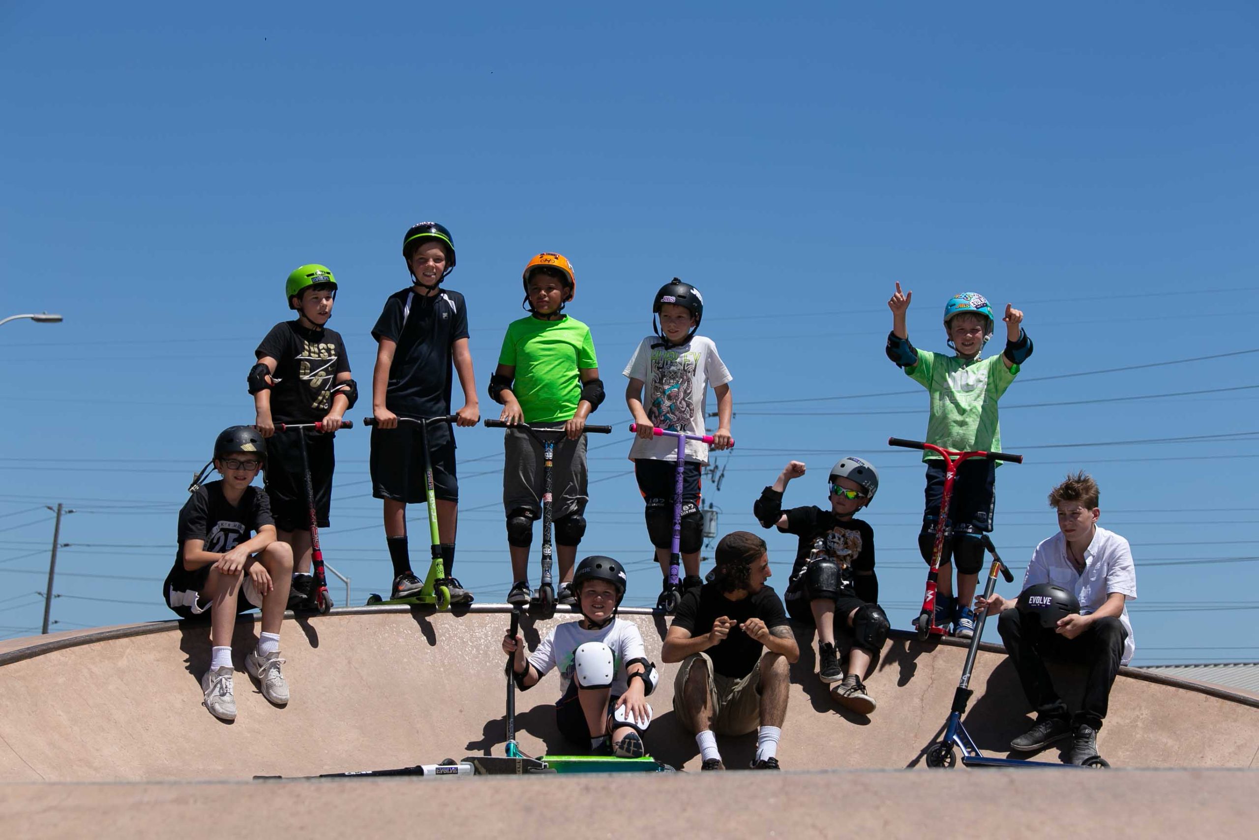 Burlington Summer Camp| Camper learning how to Scooter and Skateboard| Evolve Camps