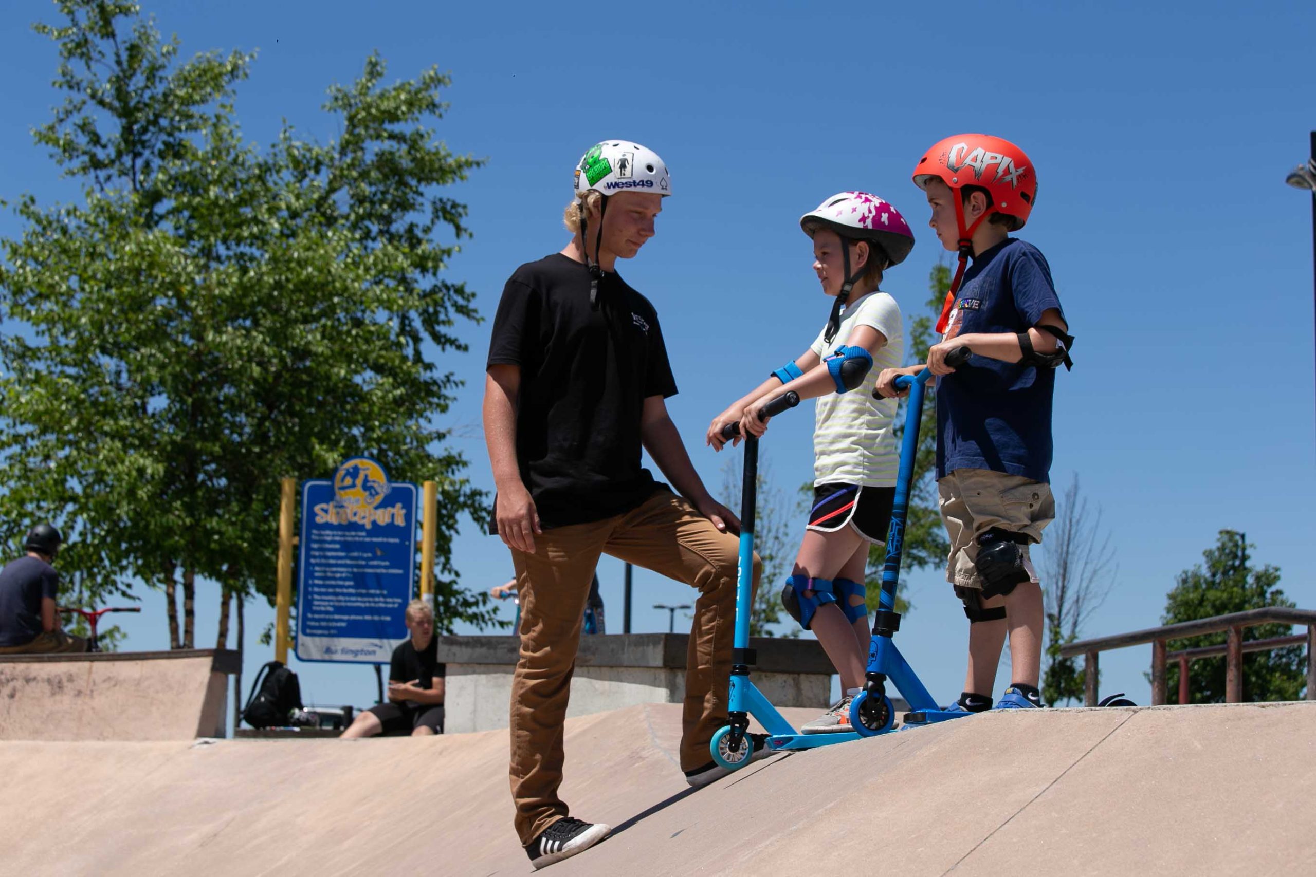 Burlington Summer Camp| Camper learning how to Scooter and Skateboard| Evolve Camps